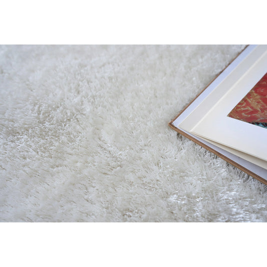 Luxe Shag 5494 Rug by Exquisite Rugs in ivory. Made from polyester, microfiber in a unique style.