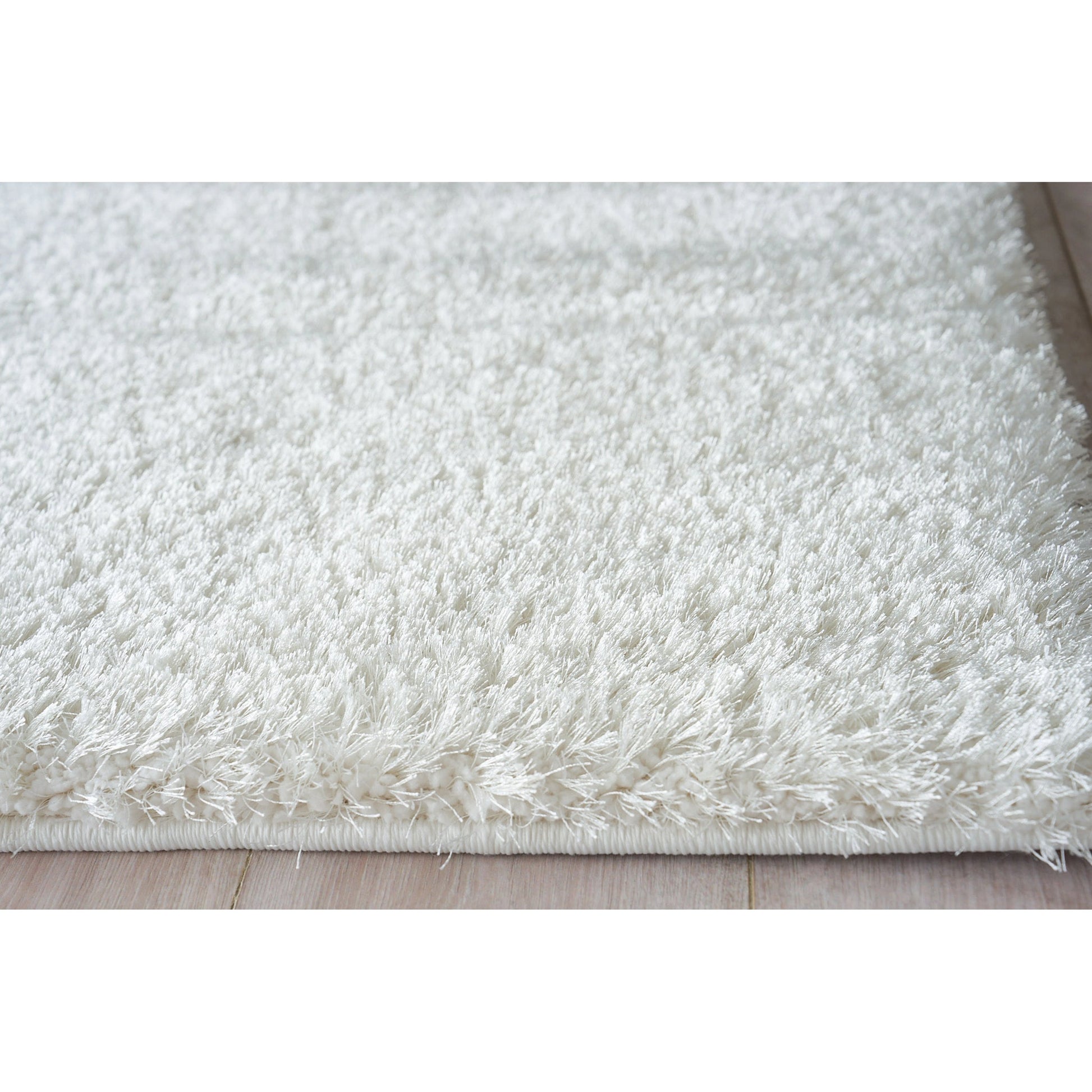 Luxe Shag Rug by Exquisite Rugs. Made from polyester, microfiber in a unique style.