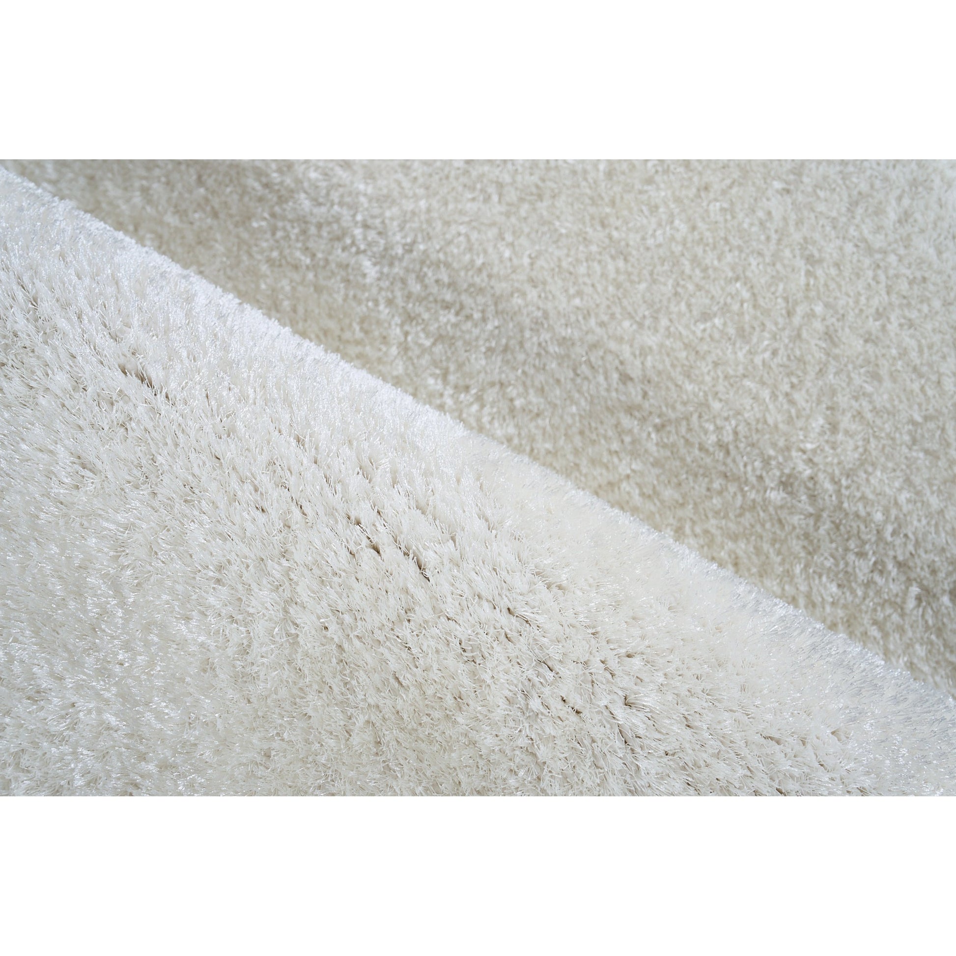 Luxe Shag Rug by Exquisite Rugs. Made from polyester, microfiber in a unique style.
