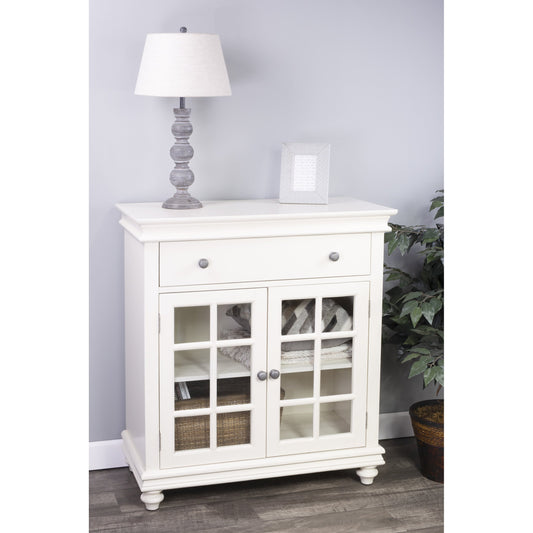 Brouno Chest by Butler Specialty Company in white. Made from mango wood, mdf, plywood, clear glass (non tempered) in a cottage & farmhouse style.