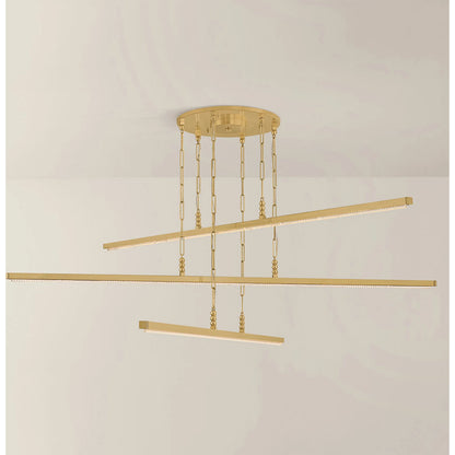 Cortina Chandelier by Corbett in vintage brass. Made from unique in a modern style.