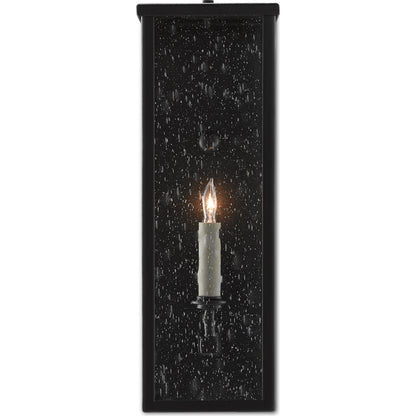 Tanzy Outdoor Wall Sconce by Currey and Company in midnight. Made from wrought iron, seeded glass in a transitional style.