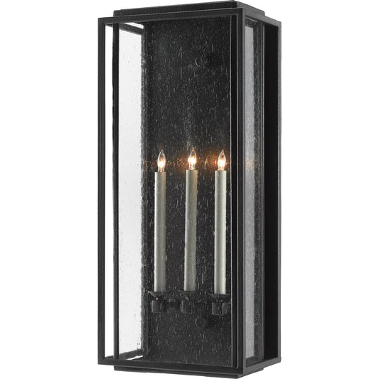 Wright Outdoor Wall Sconce by Currey and Company in midnight. Made from wrought iron, seeded glass in a transitional style.