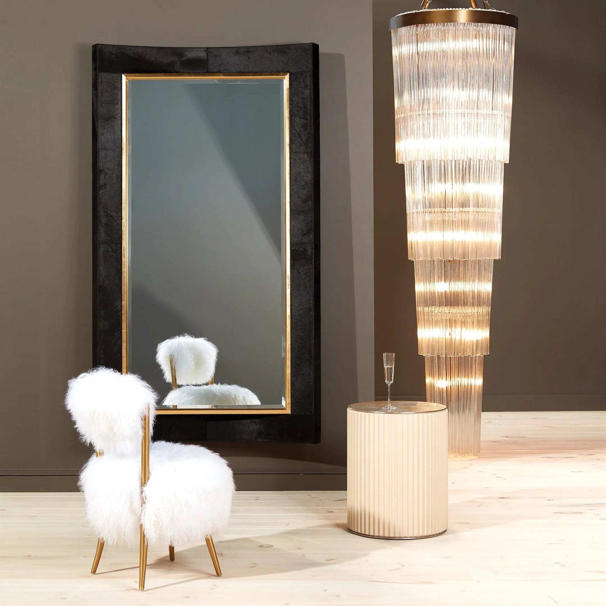 Curved Floor Mirror by Global Views in gold leaf. Made from unique in a transitional style.