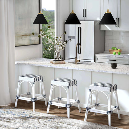 Robias Counter Stool by Butler Specialty Company. Made from rattan, polyurethane synthetic rattan in a coastal style.