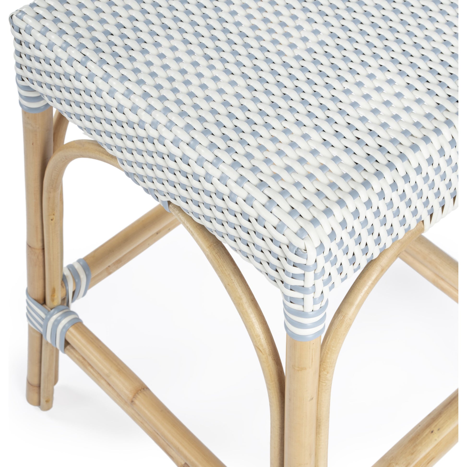 Robias Counter Stool by Butler Specialty Company. Made from rattan, polyurethane synthetic rattan in a coastal style.
