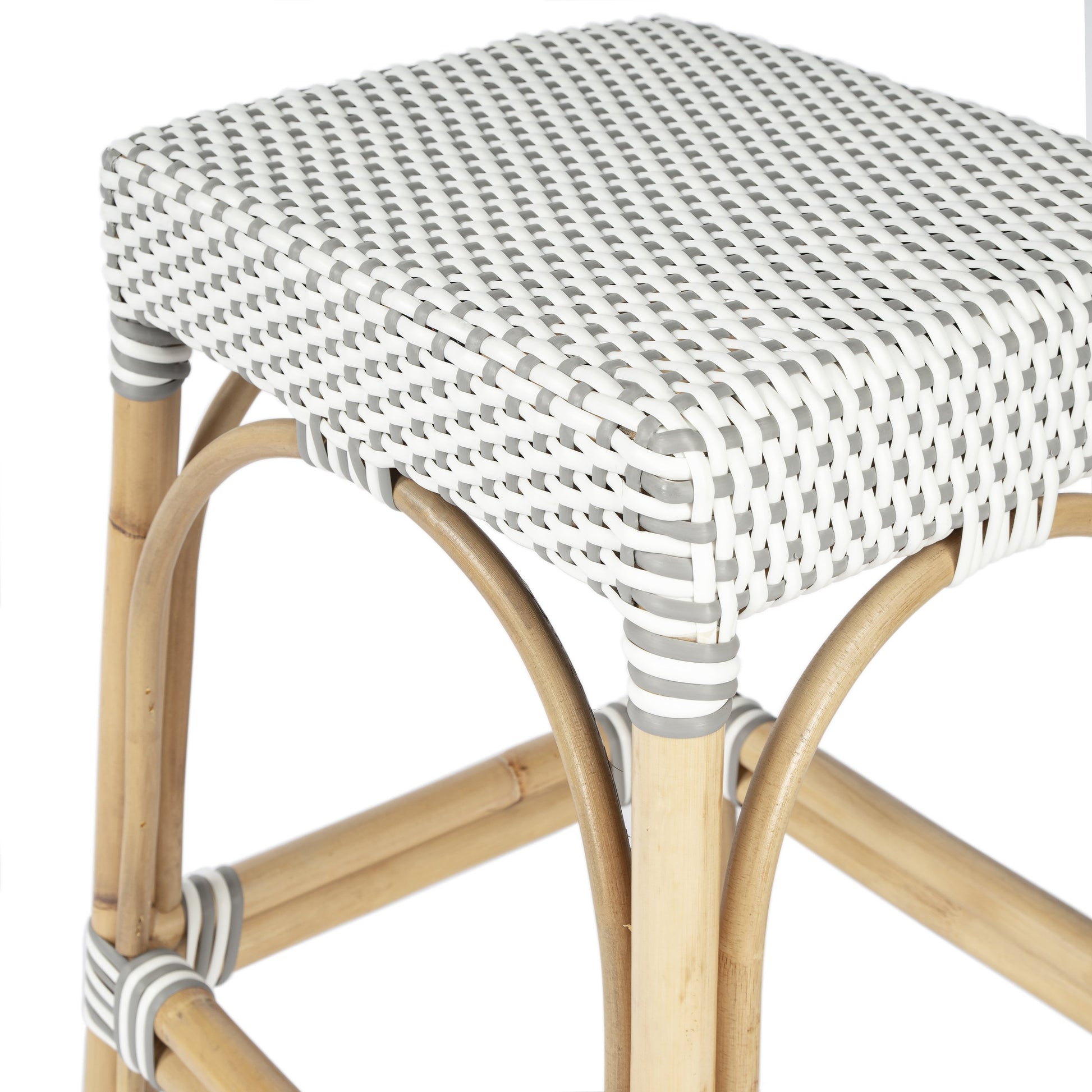 Robias Counter Stool by Butler Specialty Company. Made from rattan, polyurethane synthetic rattan in a coastal style.
