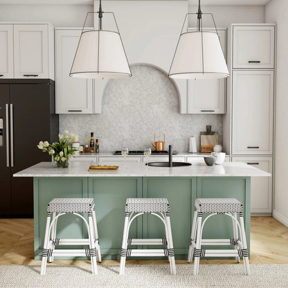 Robias Counter Stool by Butler Specialty Company. Made from rattan, polyurethane synthetic rattan in a coastal style.