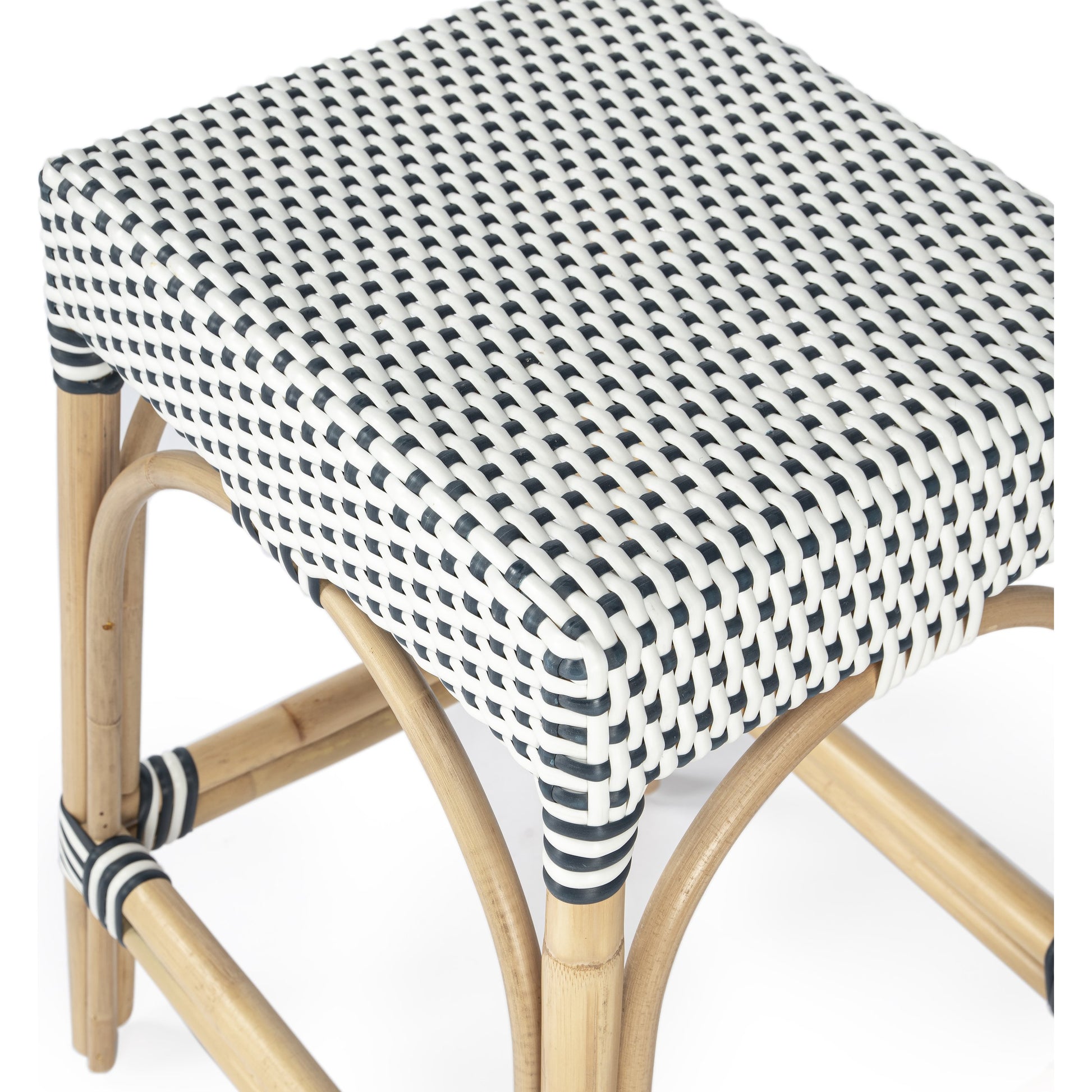 Robias Counter Stool by Butler Specialty Company. Made from rattan, polyurethane synthetic rattan in a coastal style.