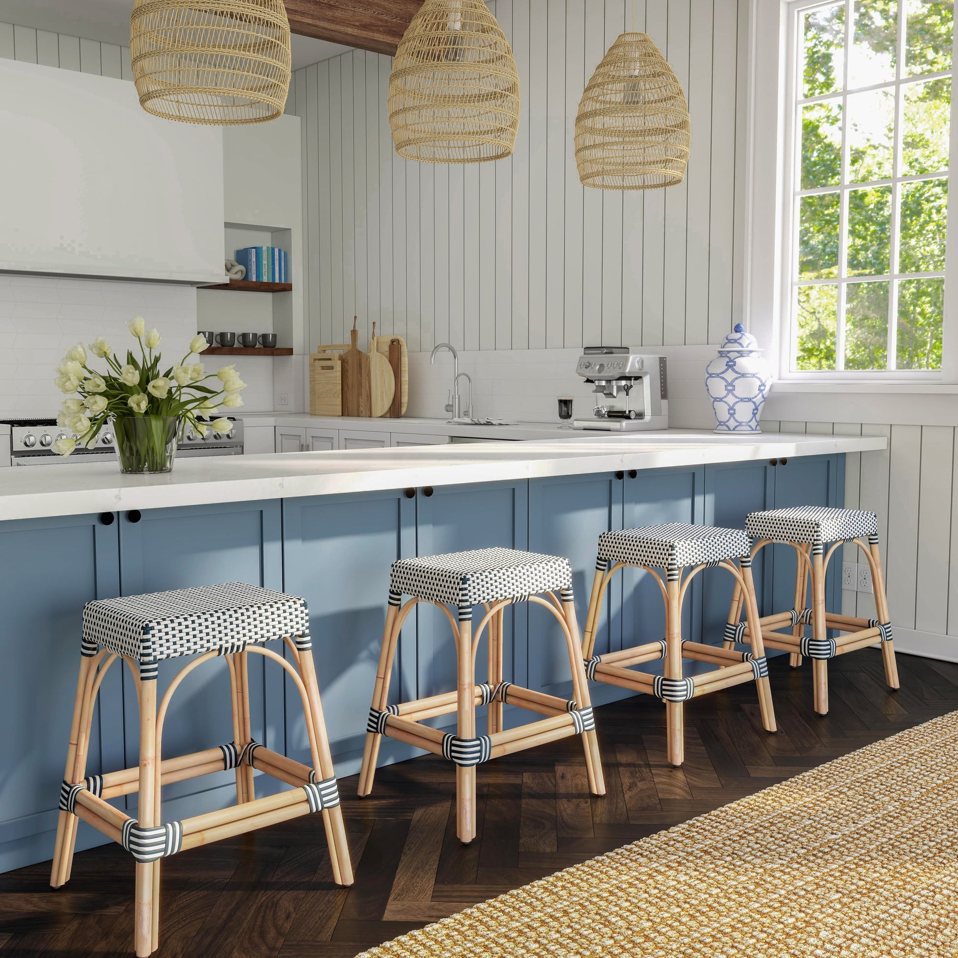 Robias Counter Stool by Butler Specialty Company. Made from rattan, polyurethane synthetic rattan in a coastal style.