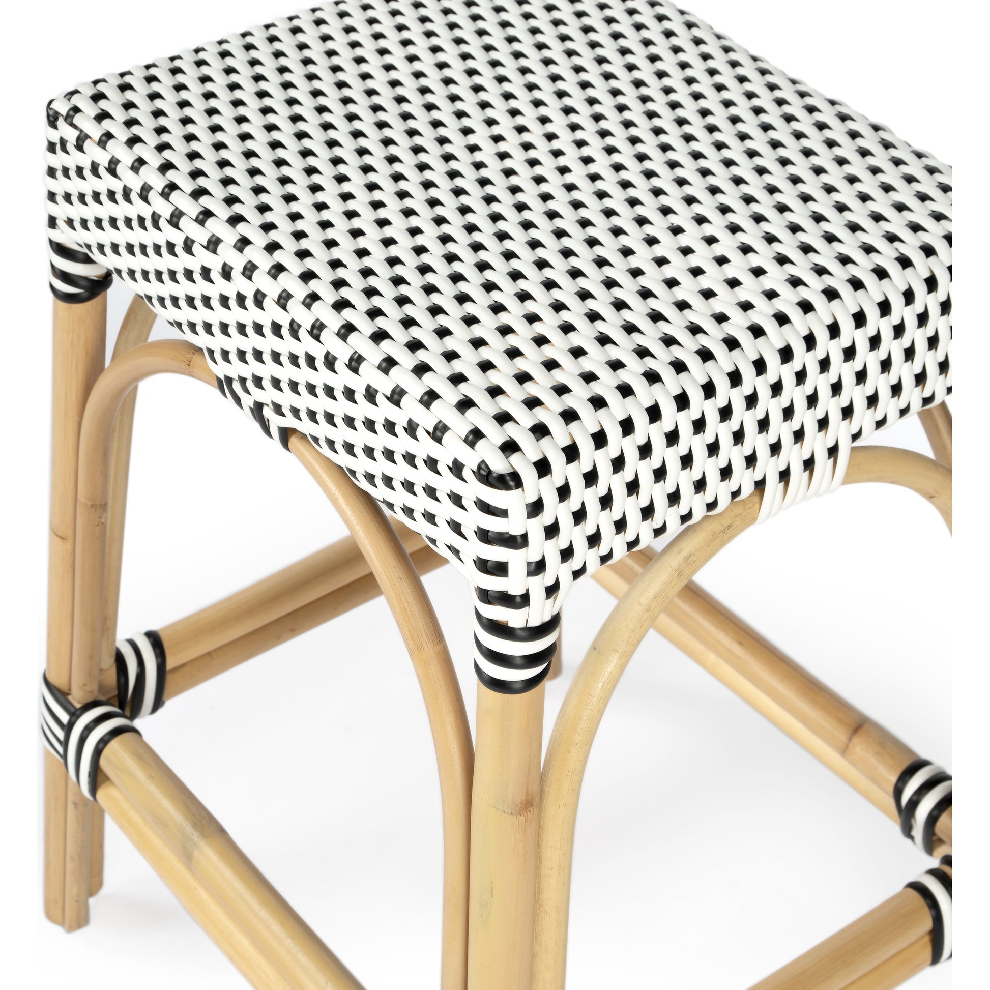 Robias Counter Stool by Butler Specialty Company. Made from rattan, polyurethane synthetic rattan in a coastal style.