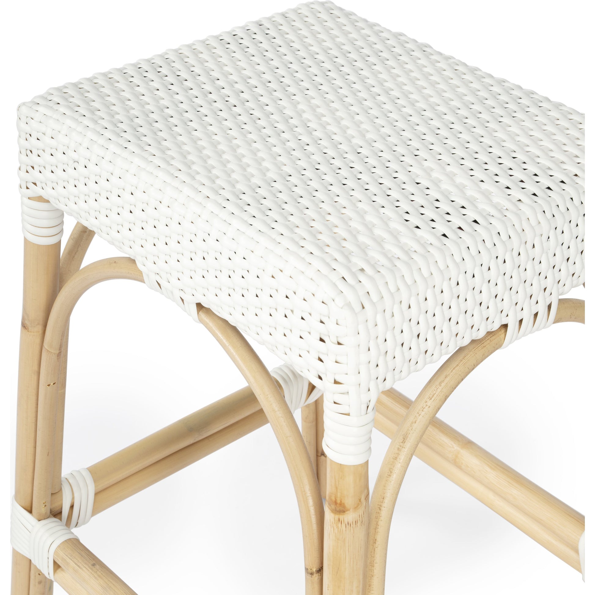 Robias Counter Stool by Butler Specialty Company. Made from rattan, polyurethane synthetic rattan in a coastal style.