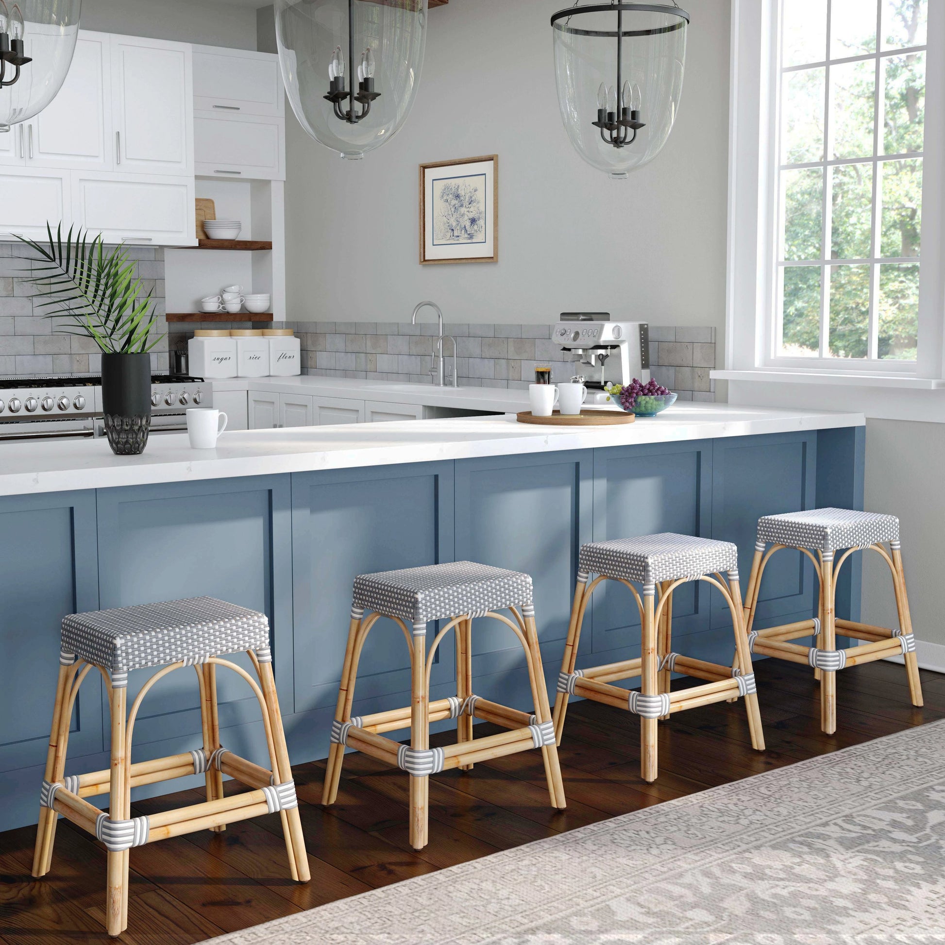 Robias Counter Stool by Butler Specialty Company. Made from rattan, polyurethane synthetic rattan in a coastal style.