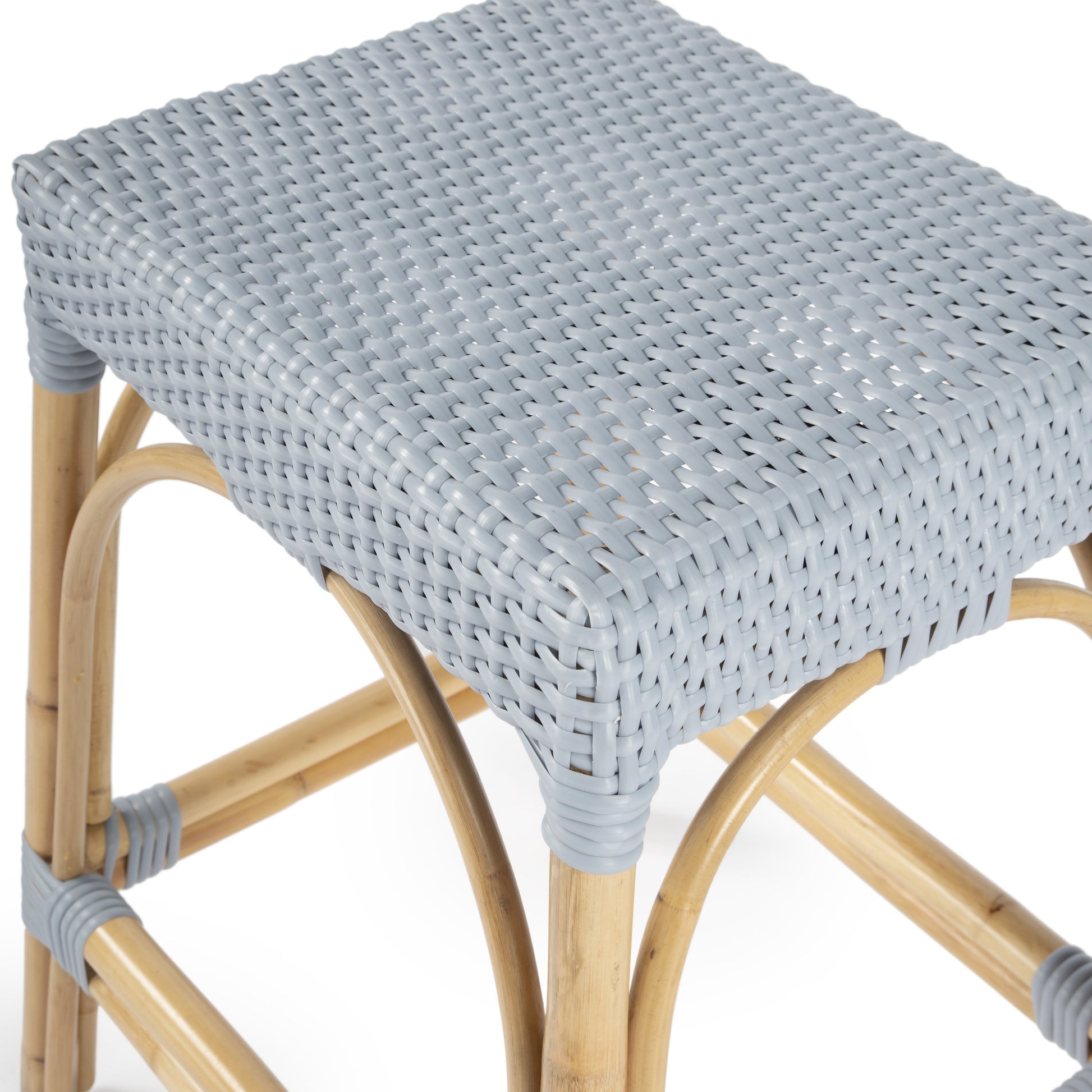 Robias Counter Stool by Butler Specialty Company. Made from rattan, polyurethane synthetic rattan in a coastal style.