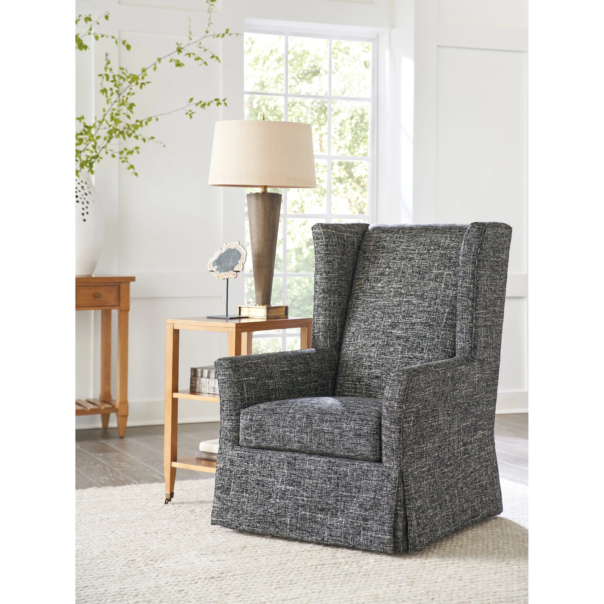 El Moro Swivel Chair by Barclay Butera in black. Made from unique in a modern style.