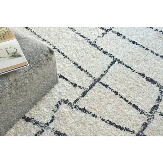 Tahoe 5559 Rug by Exquisite Rugs in ivory, black. Made from new zealand wool in a unique style.