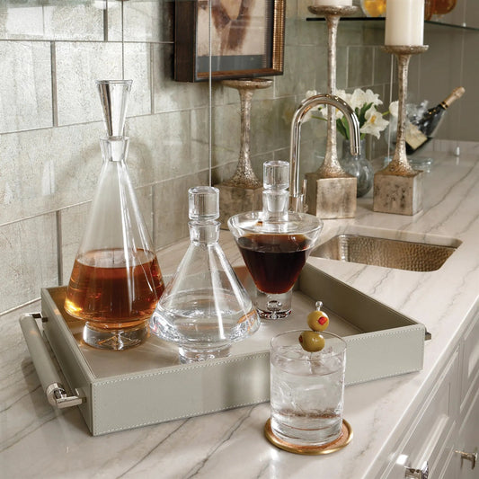 High Shoulder Decanter by Global Views. Made from glass in a transitional style.