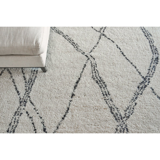 Tahoe 5560 Rug by Exquisite Rugs in ivory, black. Made from new zealand wool in a unique style.