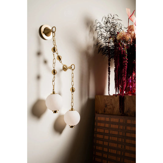 Corda Wall Sconce by Corbett in vintage brass. Made from unique in a modern style.