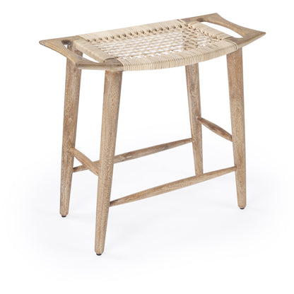 Tristan Counter Stool by Butler Specialty Company in natural wood and natural mango. Made from mango wood solids, woven cane in a coastal style.