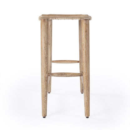 Tristan Counter Stool by Butler Specialty Company in natural wood and natural mango. Made from mango wood solids, woven cane in a coastal style.
