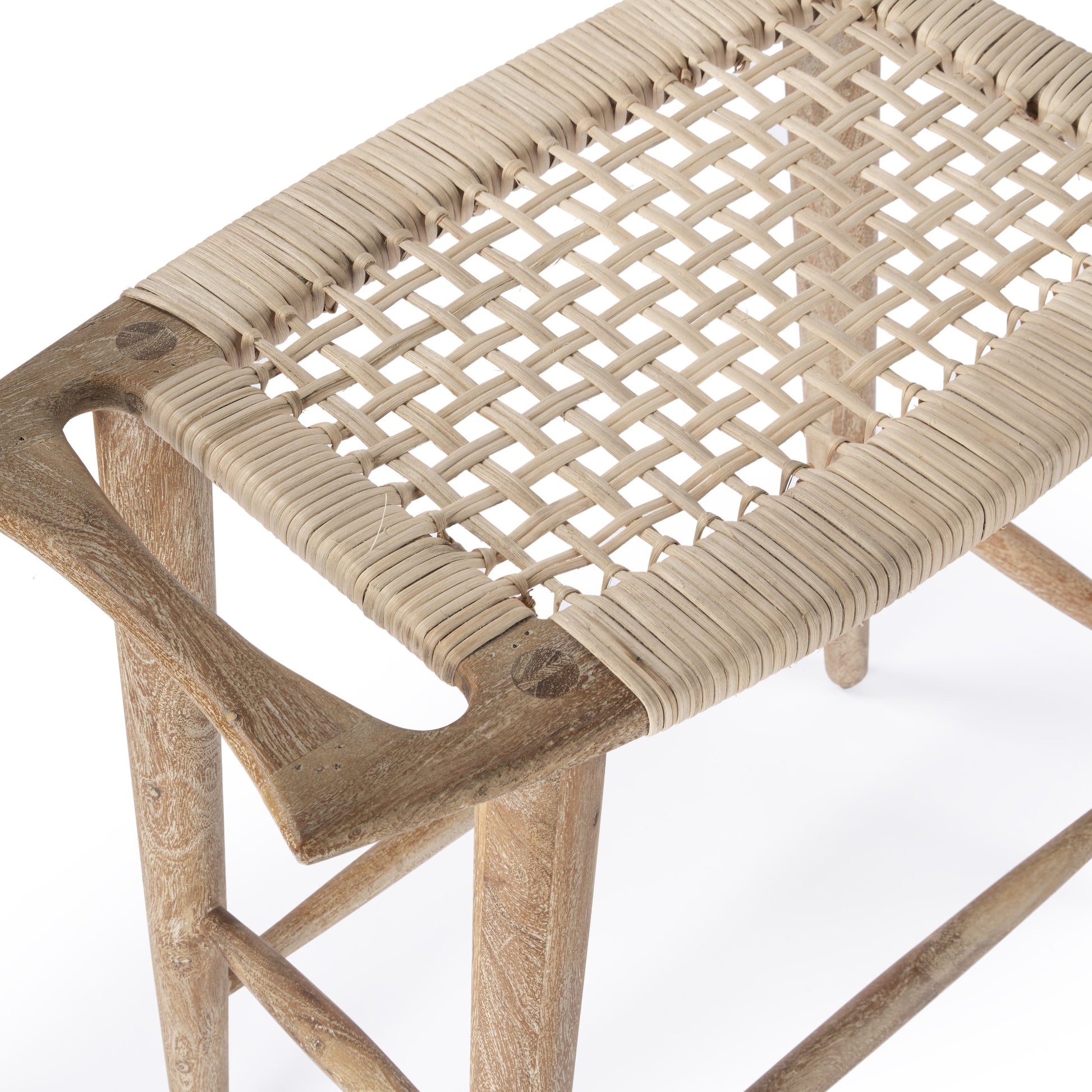 Tristan Counter Stool by Butler Specialty Company in natural wood and natural mango. Made from mango wood solids, woven cane in a coastal style.