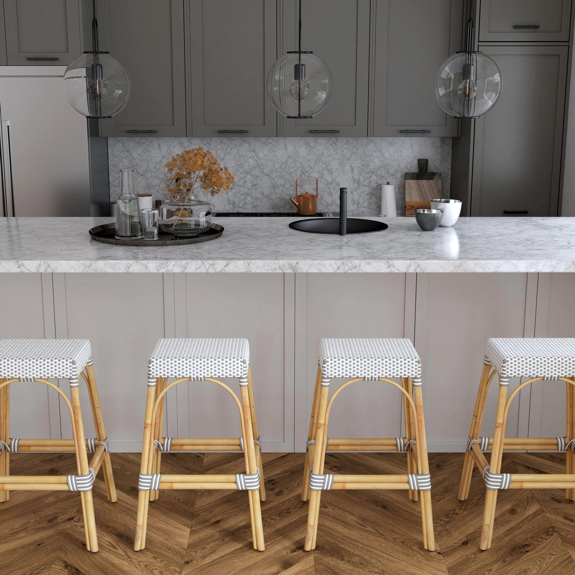 Robias Bar Stool by Butler Specialty Company. Made from natural rattan, synthetic weave in a coastal style.