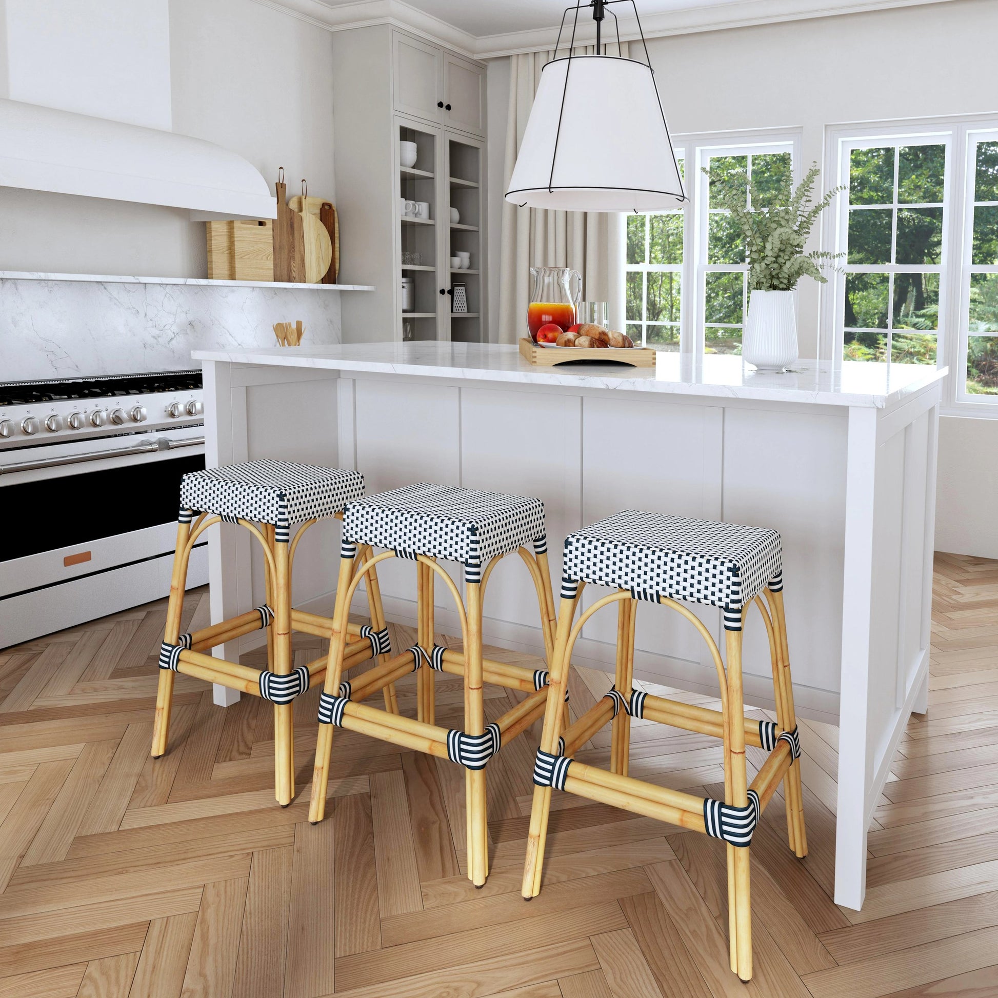 Robias Bar Stool by Butler Specialty Company. Made from natural rattan, synthetic weave in a coastal style.