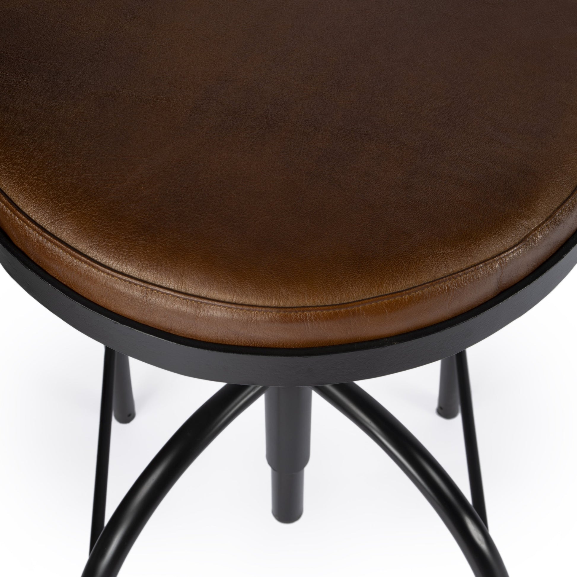 Clyde Bar Stool by Butler Specialty Company in brown and brown leather. Made from iron, brown leather, fr foam in a modern style.