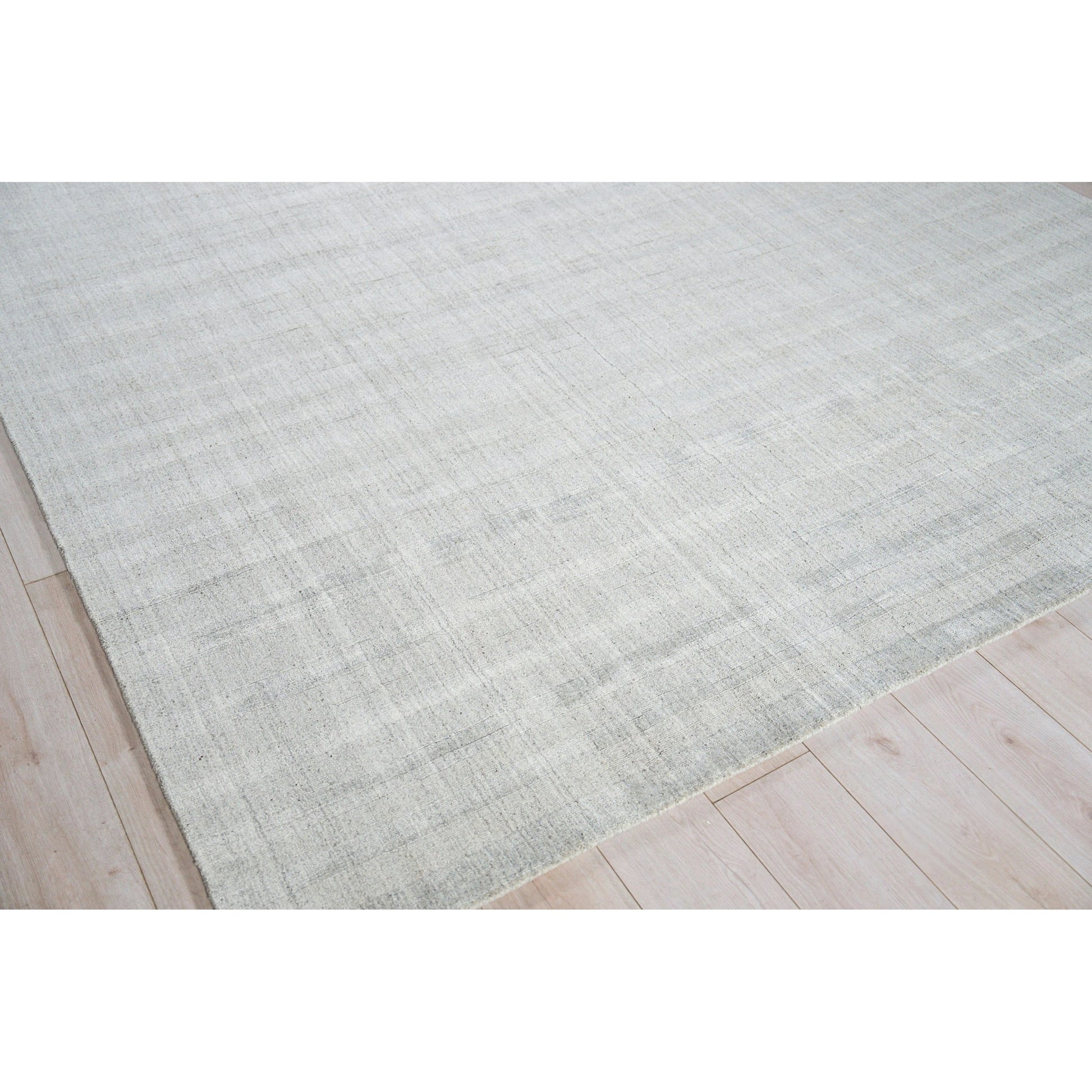 Robin Stripe 5624 Rug by Exquisite Rugs in light silver. Made from bamboo silk, new zealand wool in a unique style.