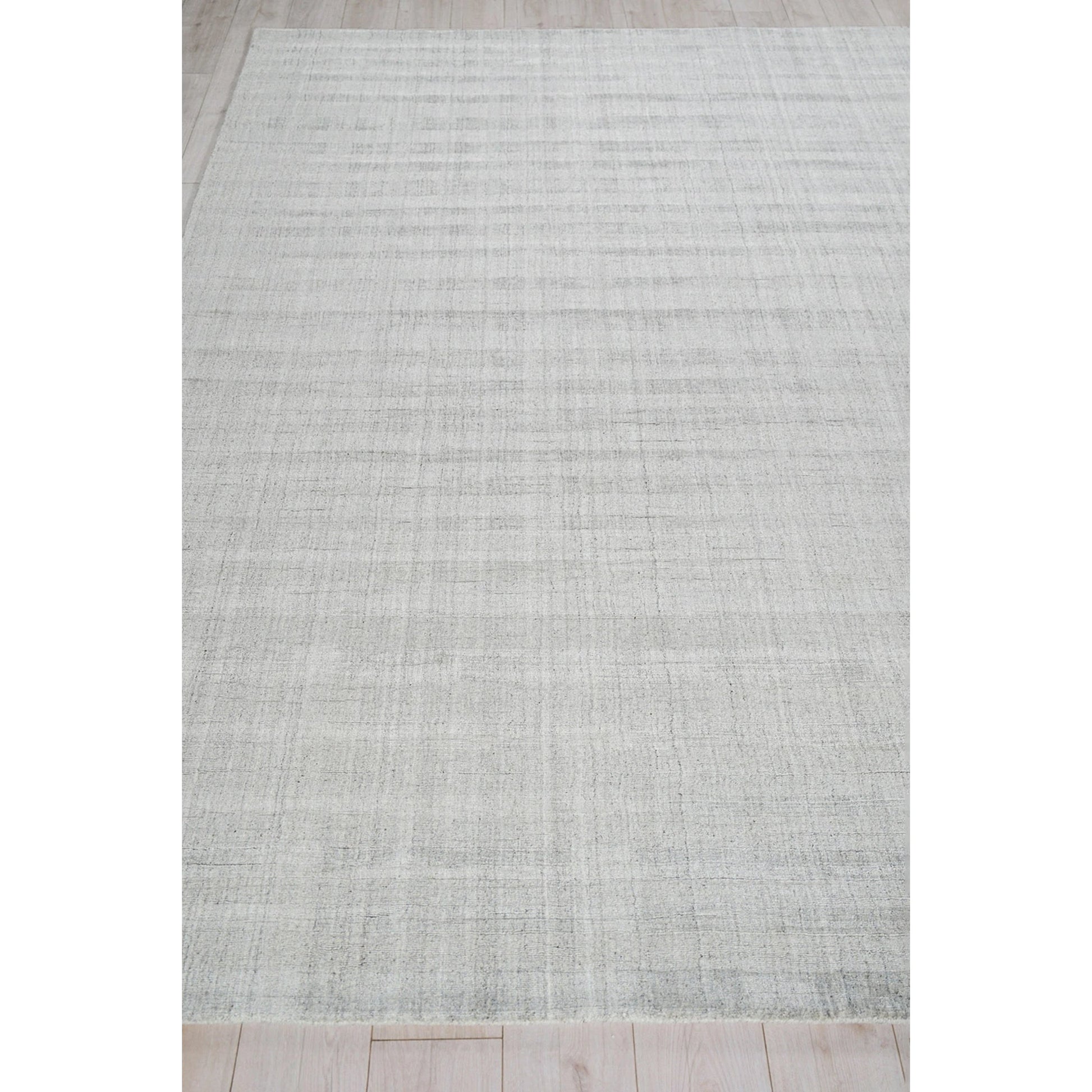Robin Stripe 5624 Rug by Exquisite Rugs in light silver. Made from bamboo silk, new zealand wool in a unique style.