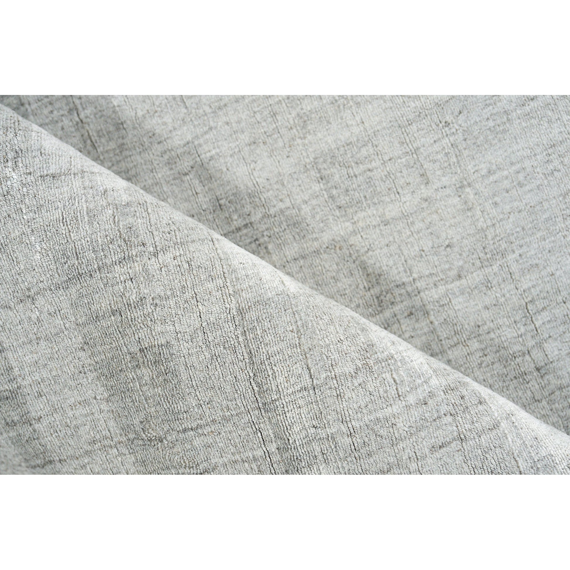 Robin Stripe 5624 Rug by Exquisite Rugs in light silver. Made from bamboo silk, new zealand wool in a unique style.