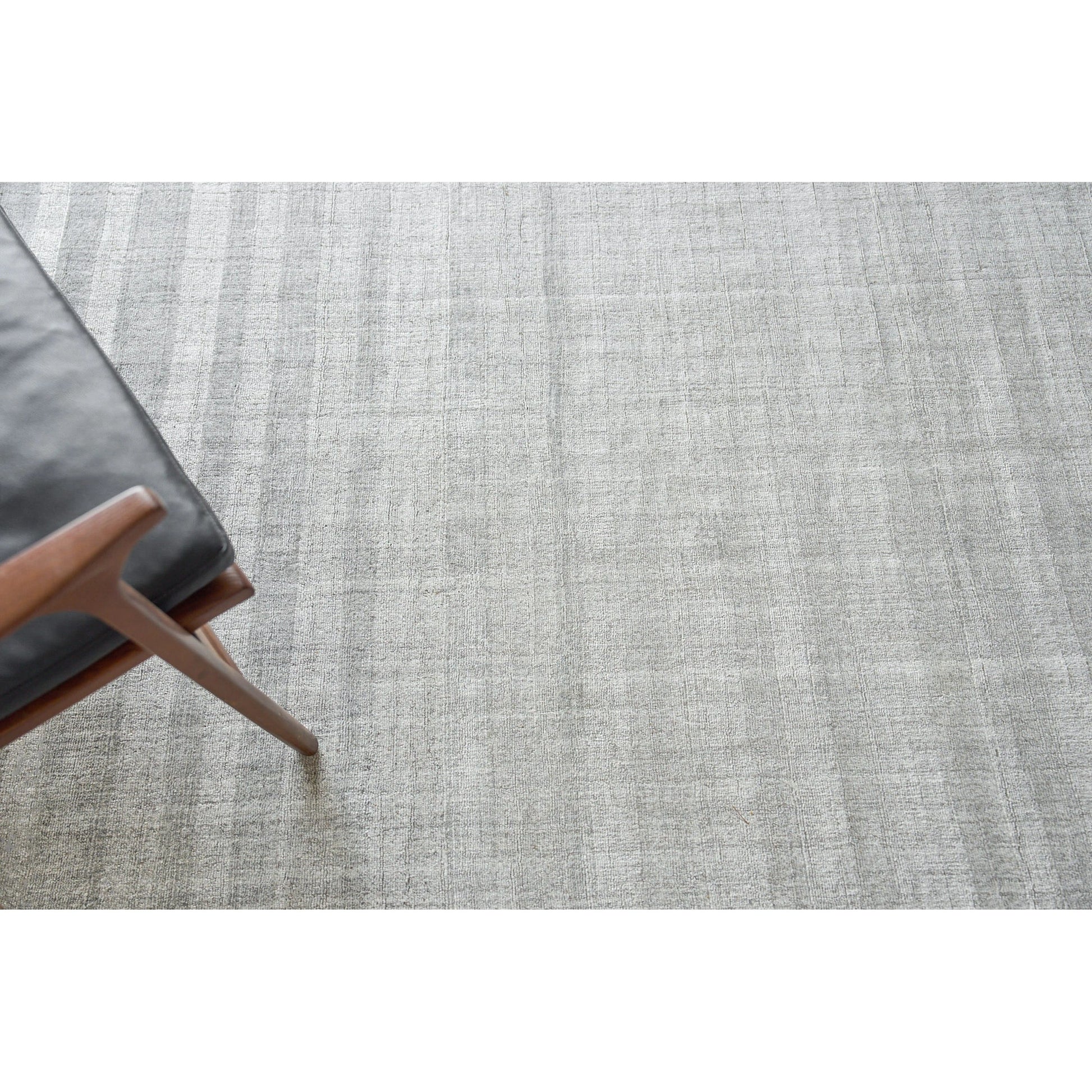 Robin Stripe 5624 Rug by Exquisite Rugs in light silver. Made from bamboo silk, new zealand wool in a unique style.