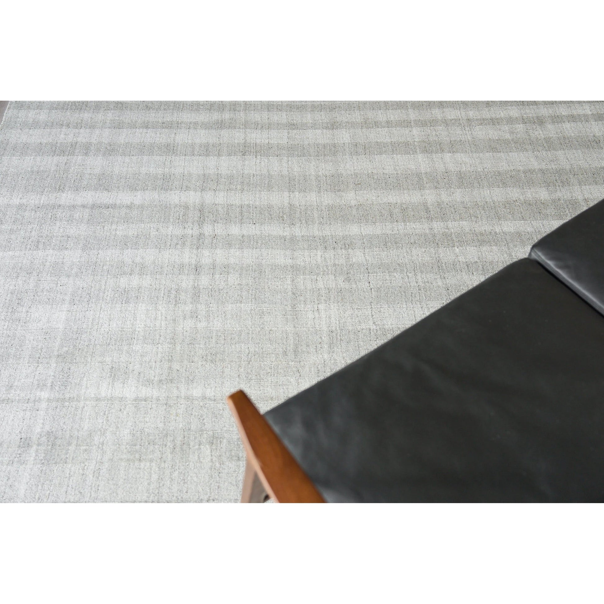 Robin Stripe 5624 Rug by Exquisite Rugs in light silver. Made from bamboo silk, new zealand wool in a unique style.