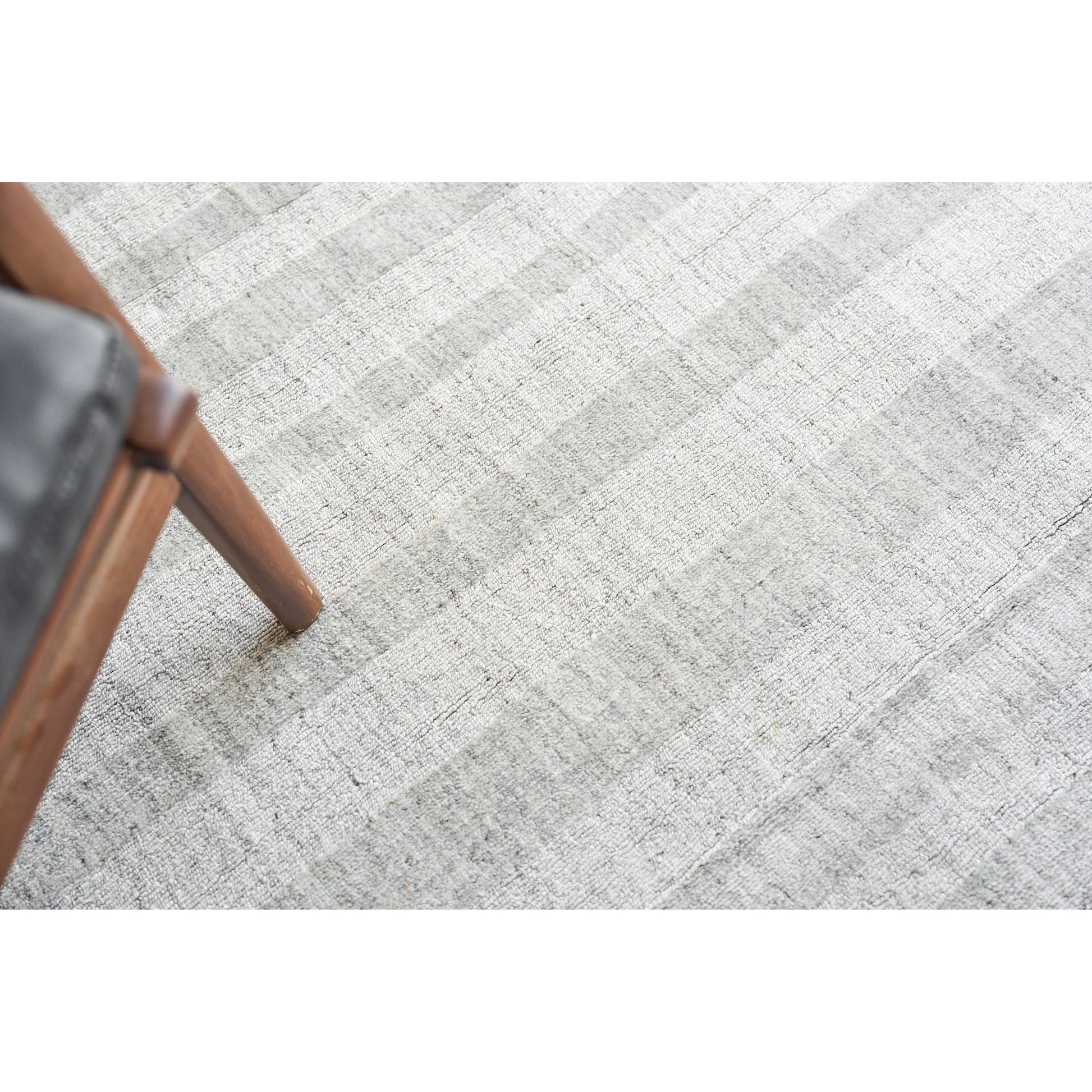 Robin Stripe 5624 Rug by Exquisite Rugs in light silver. Made from bamboo silk, new zealand wool in a unique style.