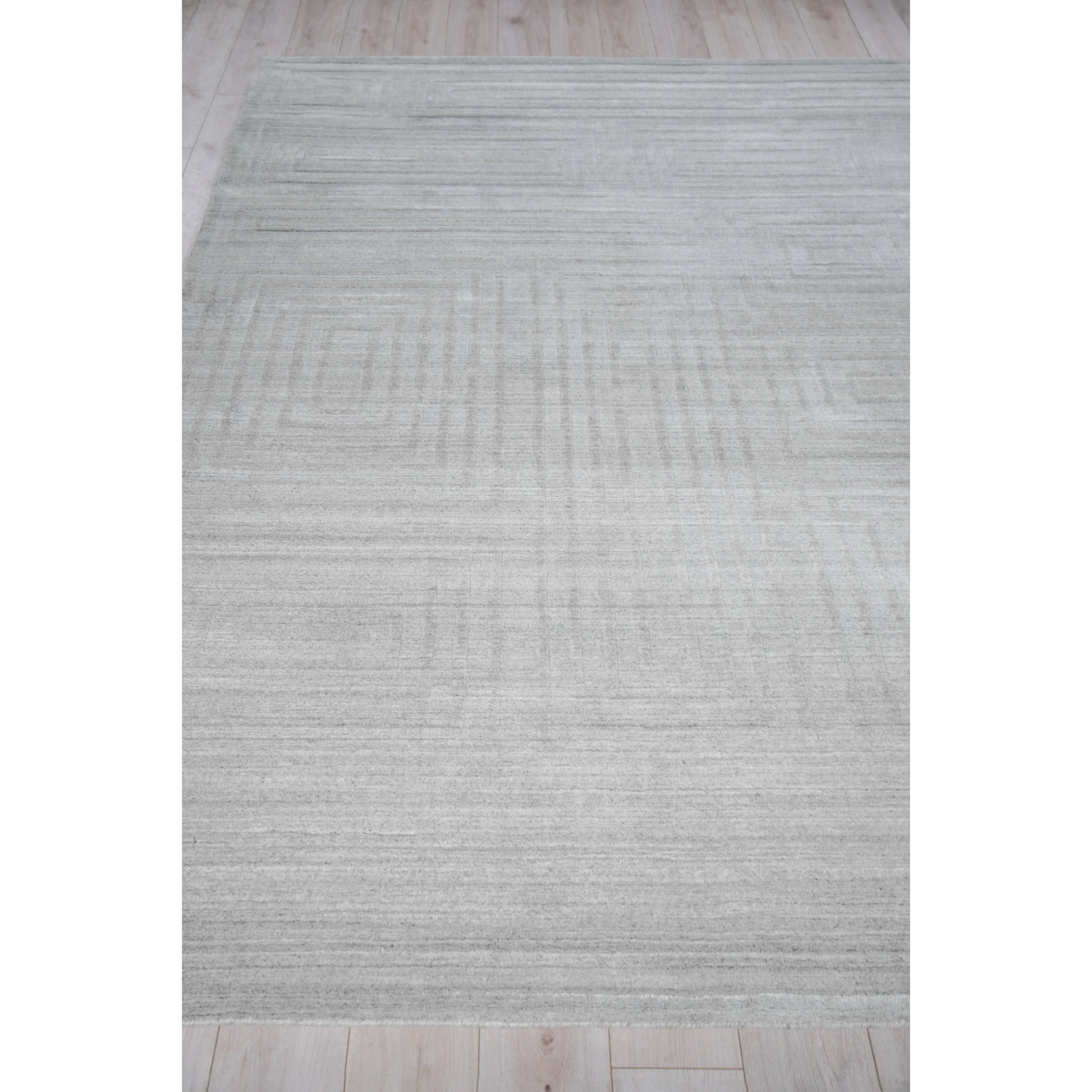 Castelli 5627 Rug by Exquisite Rugs in light gray. Made from bamboo silk, new zealand wool in a unique style.