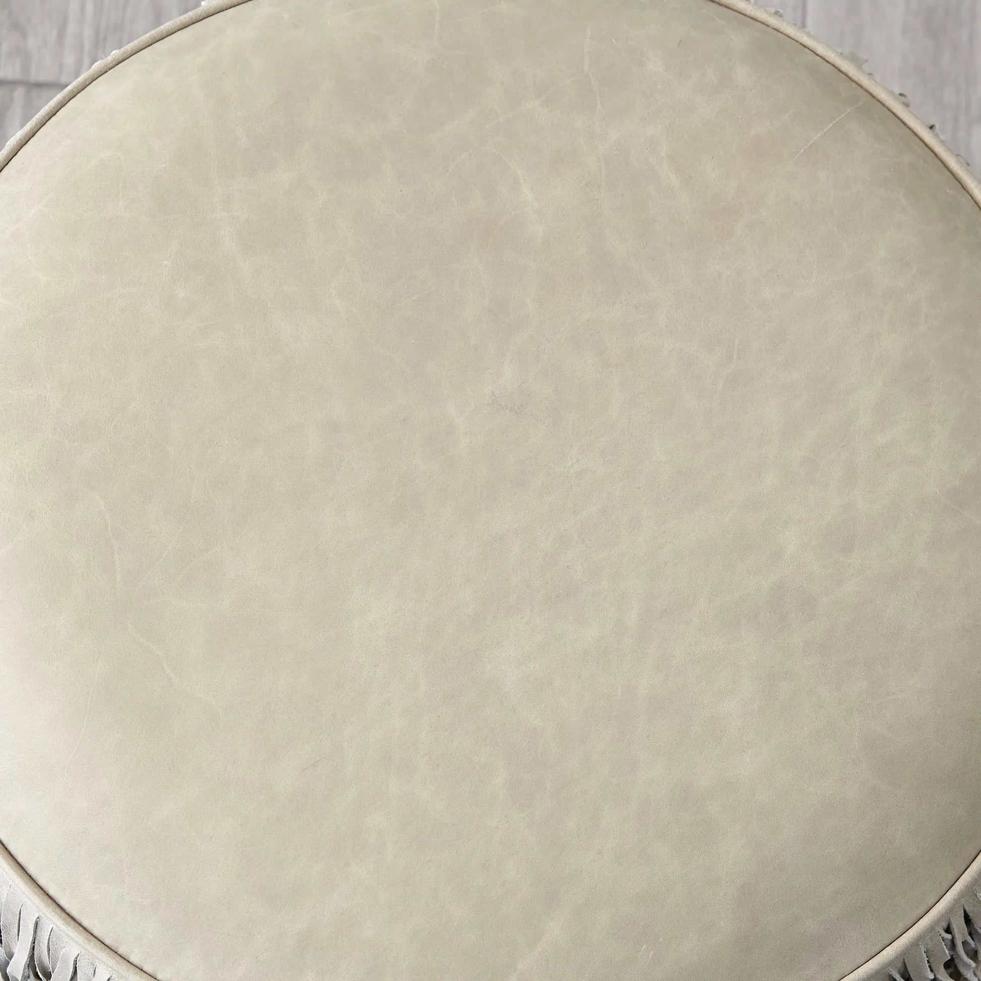 Fringe Ottoman by Global Views. Made from mdf, leather, pvc in a unique style.