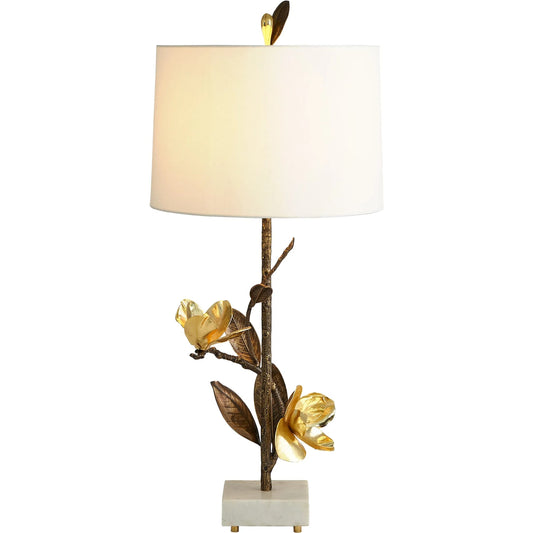 Magnolia Flower Table Lamp by Global Views in antique brass, gold. Made from brass, marble in a modern style.