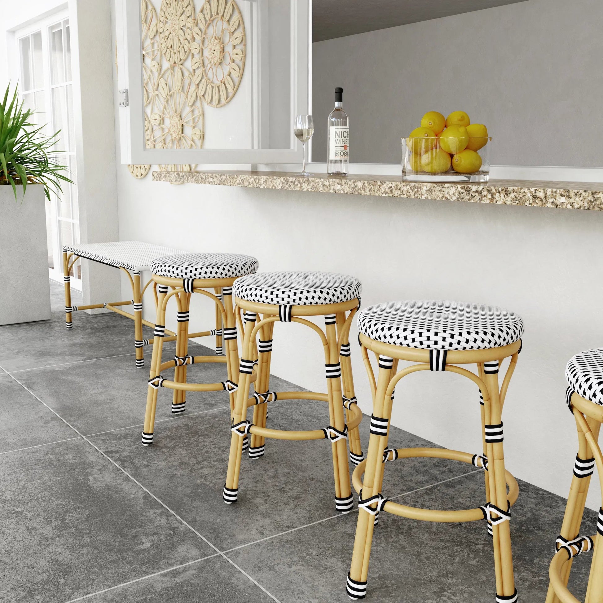 Tobias Outdoor Rattan Counter Stool by Butler Specialty Company. Made from aluminum: 80%, pe rattan weave: 20% in a coastal style.