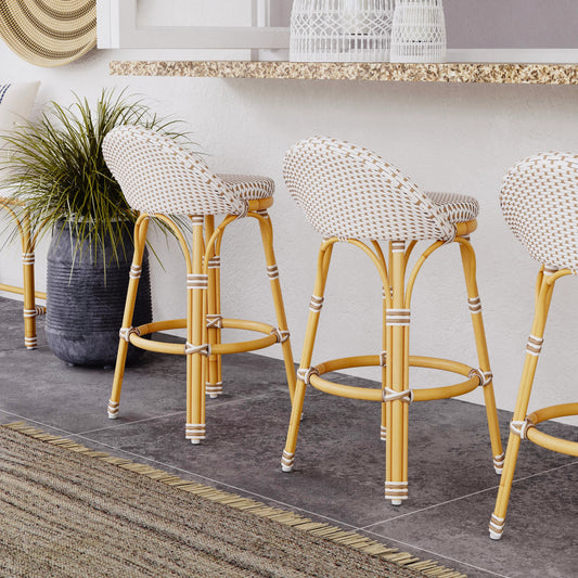 Tobias Outdoor Rattan Low Back Counter Stool by Butler Specialty Company. Made from polyethylene rattan weave, metal in a coastal style.