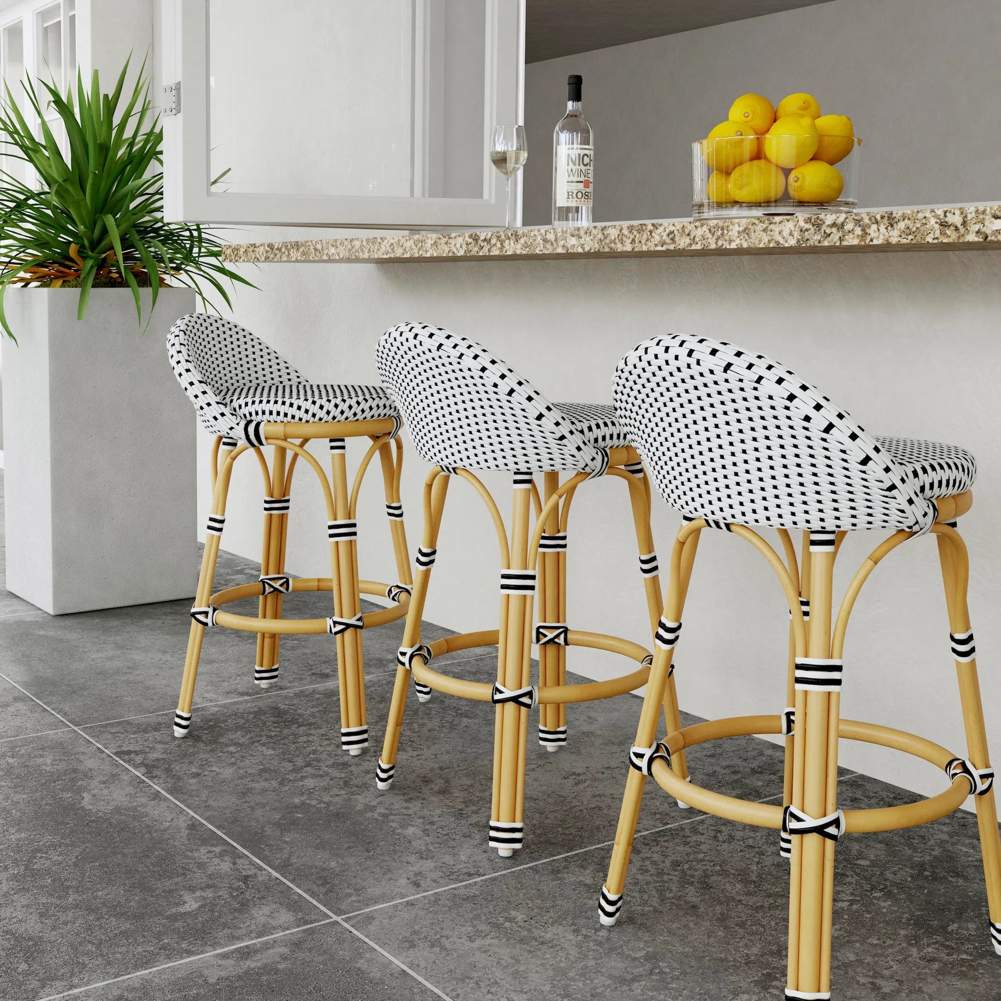 Tobias Outdoor Rattan Low Back Counter Stool by Butler Specialty Company. Made from aluminum: 80%, pe rattan weave: 20% in a coastal style.