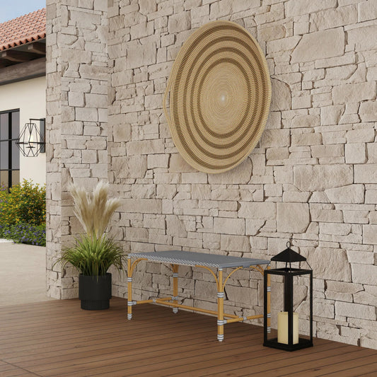 Tobias Outdoor Dining Bench by Butler Specialty Company. Made from aluminum, polyethylene rattan weave in a unique style.