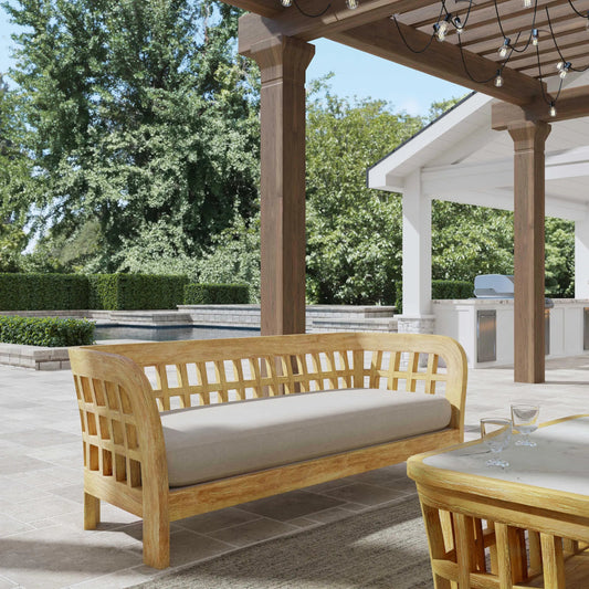 Monhegan Outdoor Sofa by Butler Specialty Company in natural and natural teak. Made from teak wood, foam, fabric in a cottage & farmhouse style.