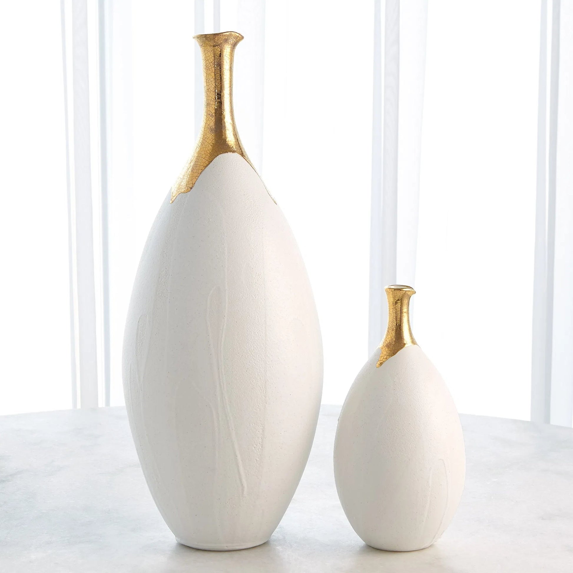 Dipped Golden Crackle/White Slender Vase by Global Views in white and gold. Made from unique in a modern style.