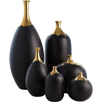 Dipped Golden Crackle/Black Sphere Vase by Global Views in black and gold. Made from unique in a modern style.