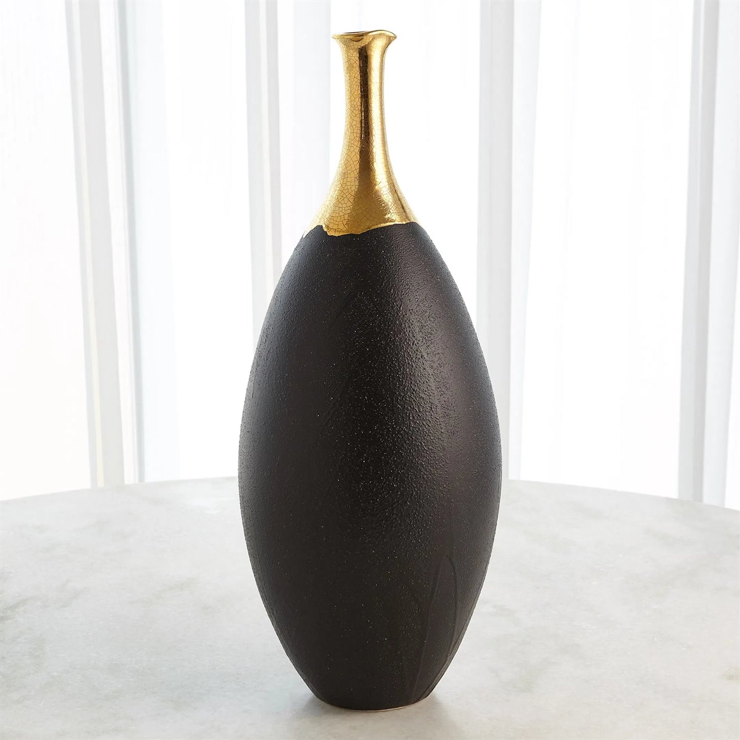 003 SI-2323449 | Lifestyle | Dipped Golden Crackle/Black Slender Vase by Global Views in black and gold. Made from unique in a modern style.