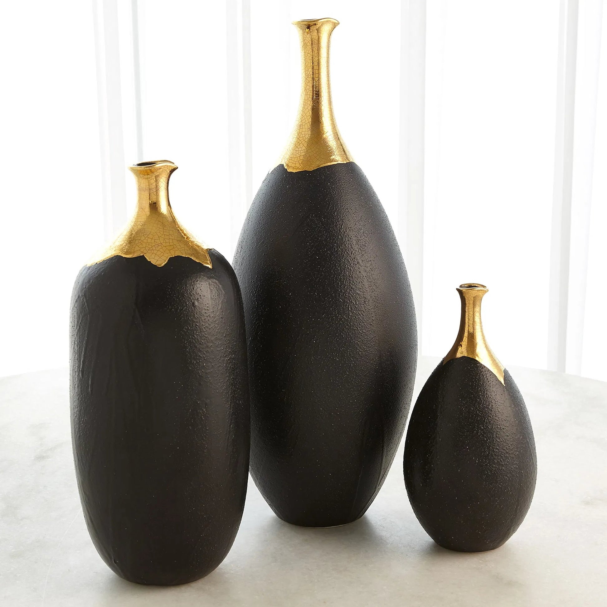 Dipped Golden Crackle/Black Cylinder Vase by Global Views in black and gold. Made from unique in a modern style.