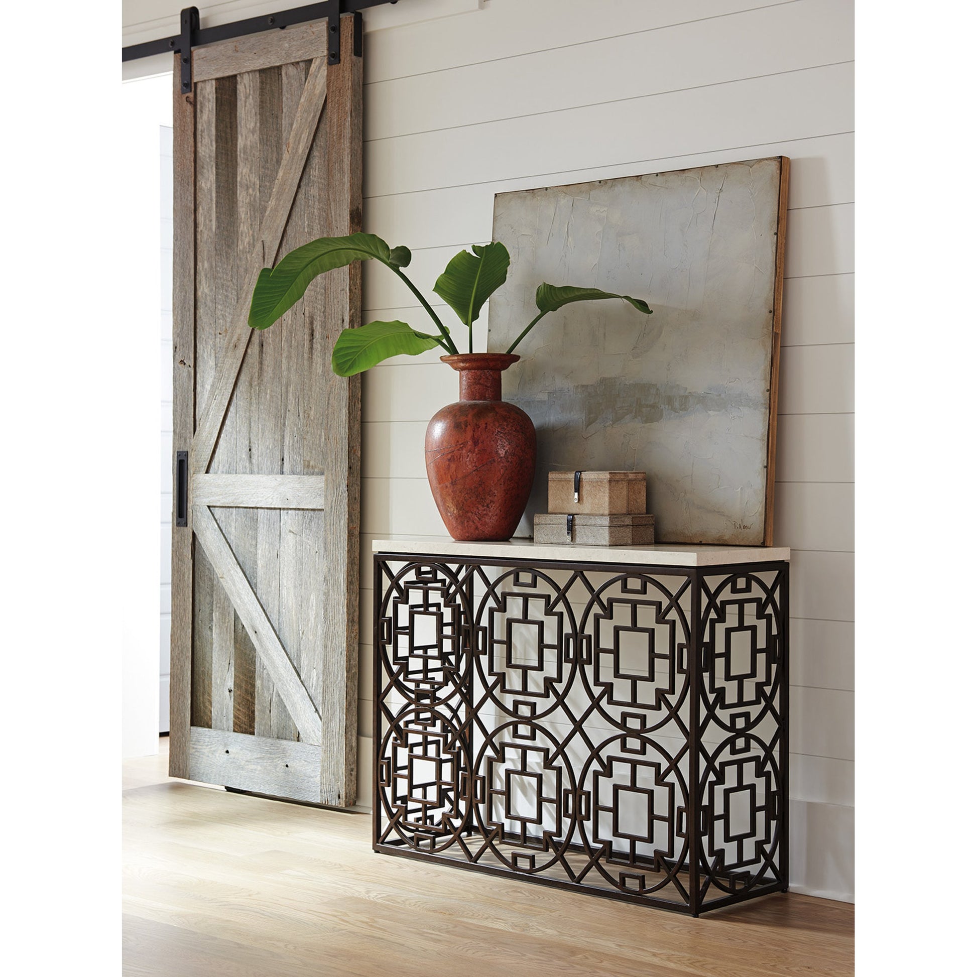 Ackermann Metal Console by Tommy Bahama Home. Made from unique in a transitional style.