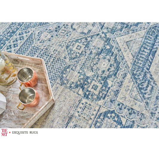 The Met X Exquisite Rugs Vintage Looms 5670 Rug by Exquisite Rugs in light blue, blue. Made from polyester in a unique style.