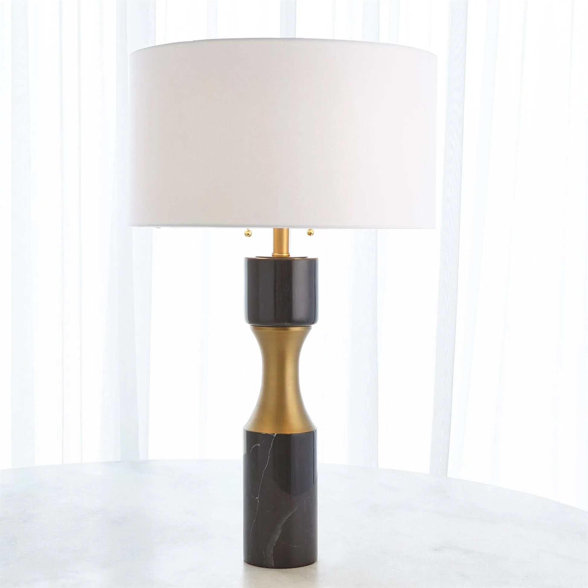 Marble Cinch Lamp by Global Views. Made from marble, brass in a transitional style.